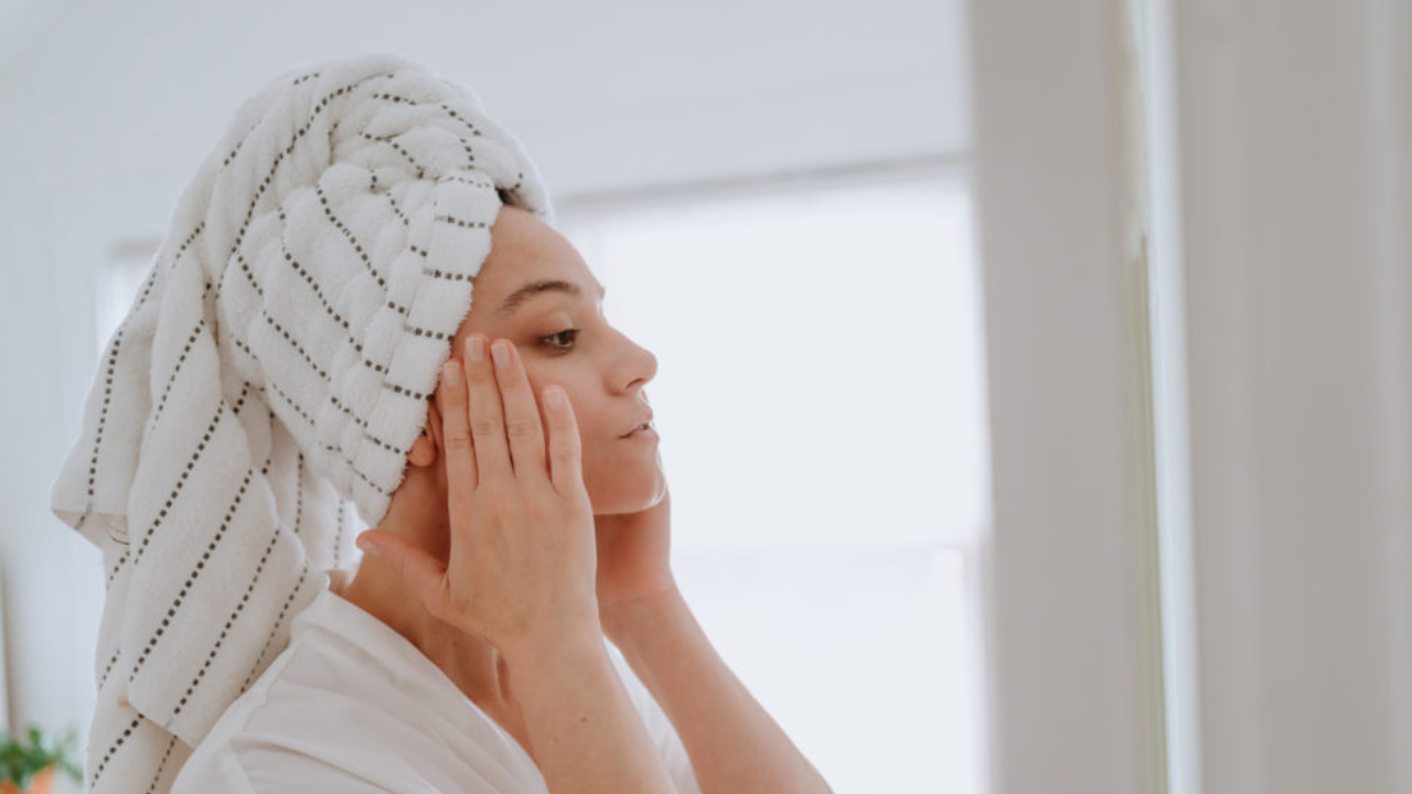 woman washing face